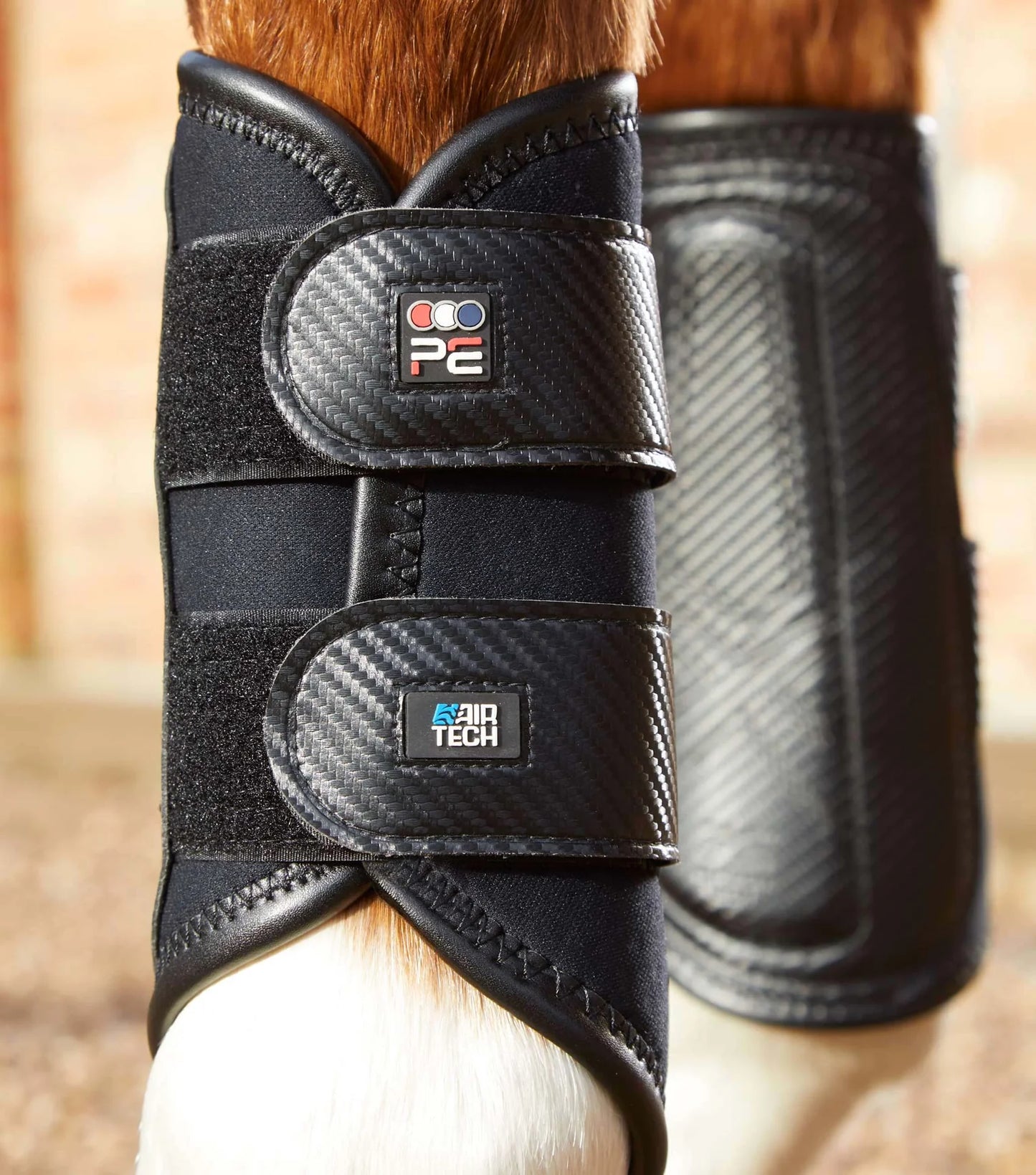 Guêtres de dressage PREMIER EQUINE Air-Tech en carbon (double fermeture)